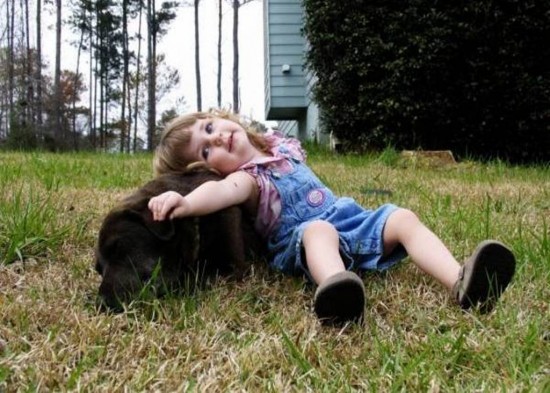 Baby Playing With Dog