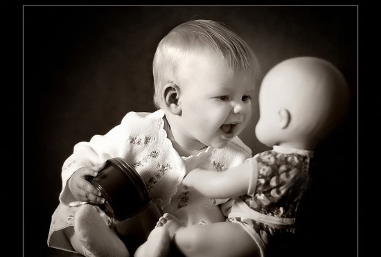 Baby Playing With Doll