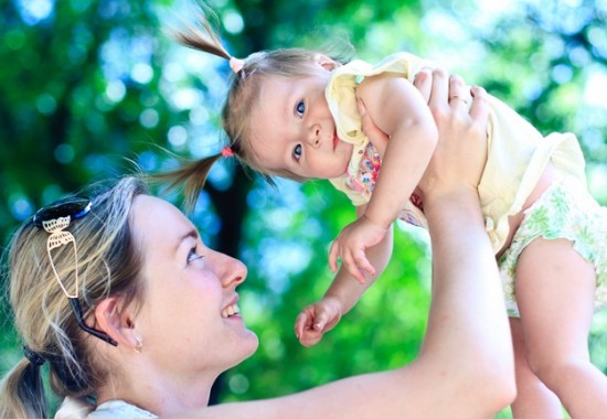 Baby Playing With Her Mom