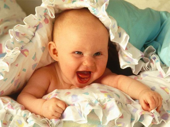 Baby Playing With Pillow