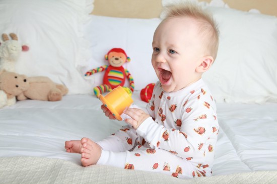 Baby Playing With Teddy