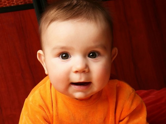 Baby Wearing Orange Dress