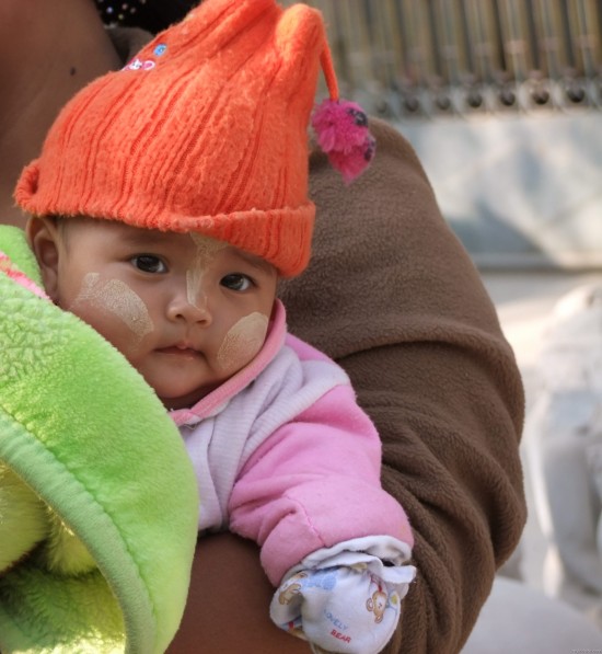 Baby With Orange Cap