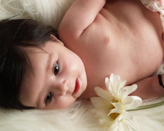 Baby With White Flower