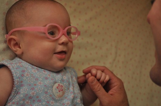 Little Baby With Pink Glasses