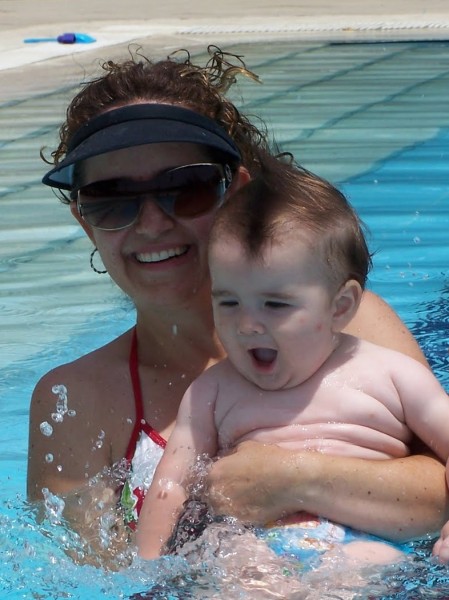 Playing Baby In Swiming Pool