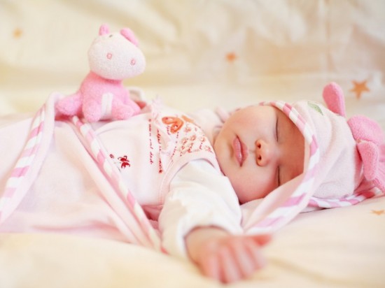 Sleeping Baby With Small Teddy Bear