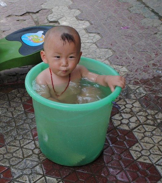 Baby In Bucket