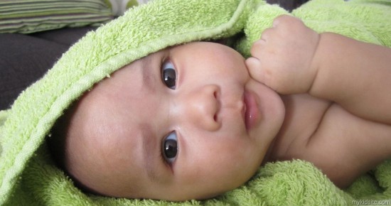 Baby With Green Towel