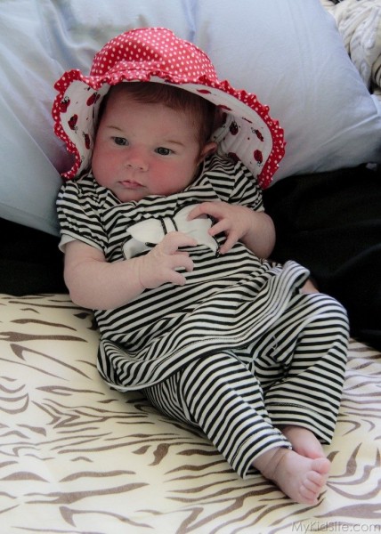 Baby With Red Cap