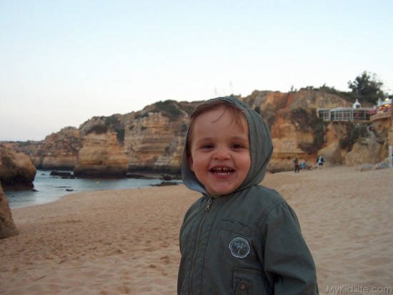 Handsome Boy On Beach