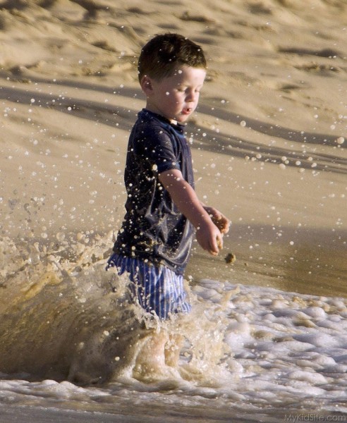 Playing On Beach