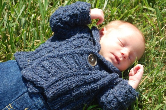 Sleeping Baby On Grass