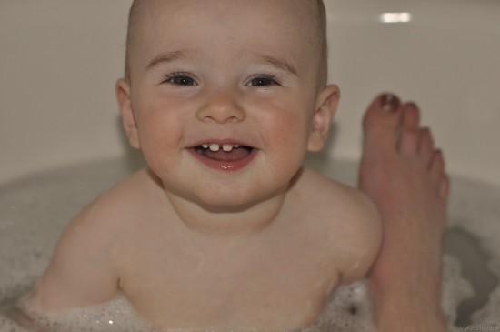Smiling Baby In Bath Tub