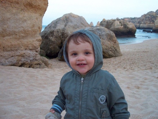 Smiling Baby On Beach