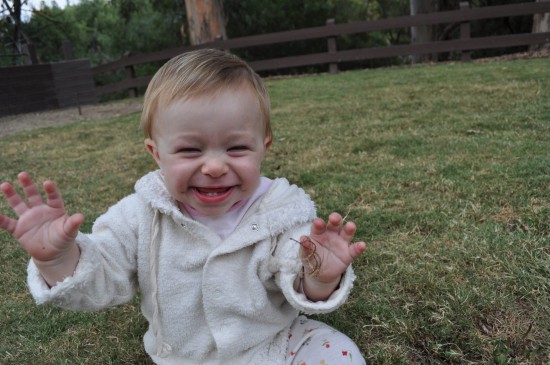 Smiling Baby On Grass