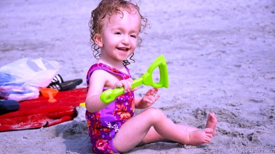 Smiling Girl On Beach