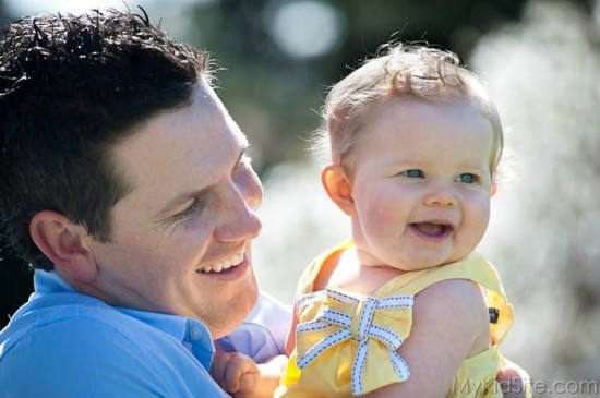 Smiling Girl With Father