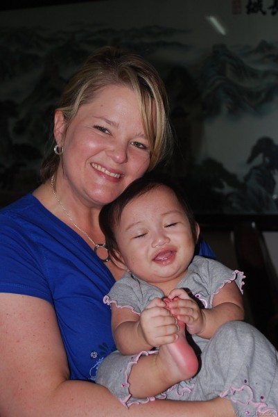 Smiling Girl With Mom