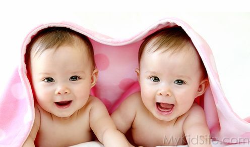 Babies In Blanket