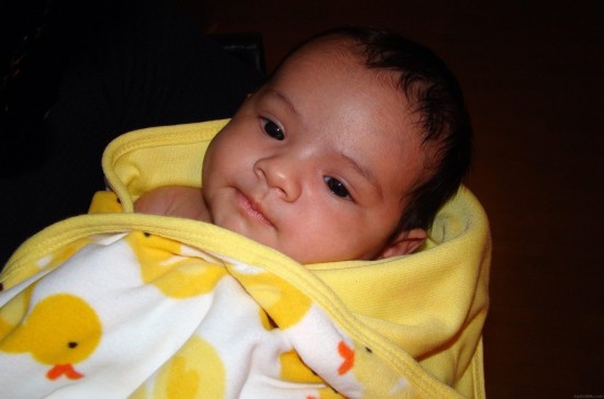 Baby In Yellow Towel