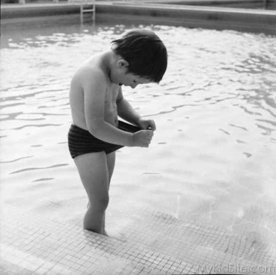 Boy In Swimming Pool