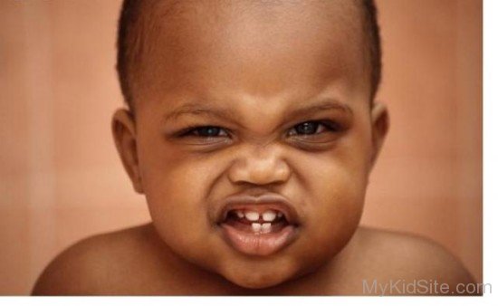 African Baby Showing His Teeth