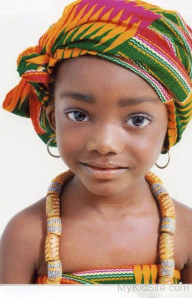 African Girl In Colourful African Dress