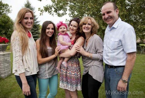 Albanian Baby Girl With Her Familyf