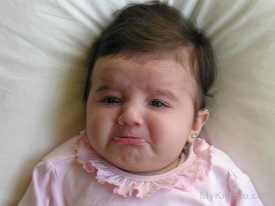 Angry Baby Weeping On His Bed