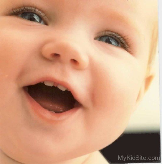 Baby Boy Showing His Teeth