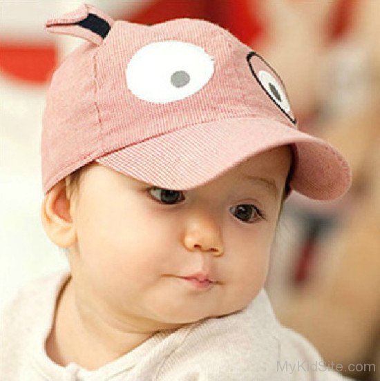 Baby Boy Wearing A Stylish Cap