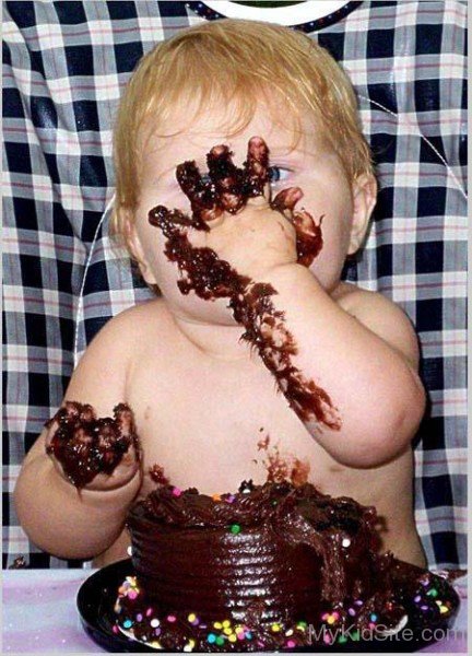 Baby Eating Choclate Cake