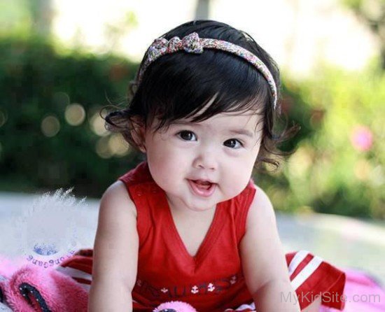 Baby Wearing Red Dress