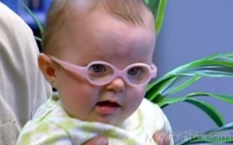 Baby With Pink Glasses