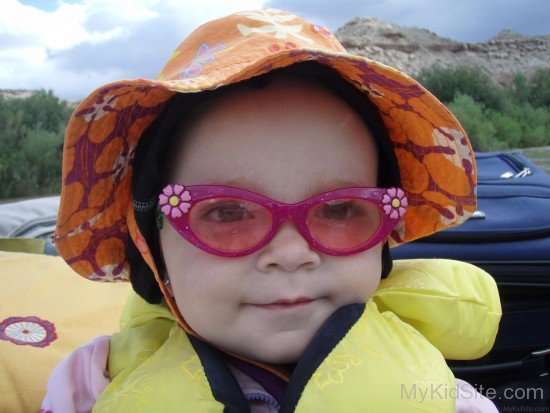 Baby With Red Glasses