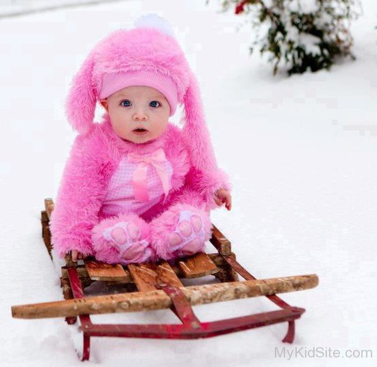Toddler Baby Girl in Snow