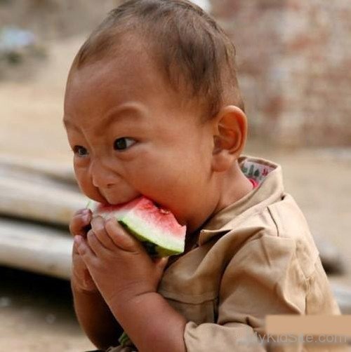 Baby Eating Watermelon