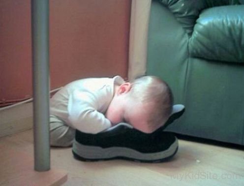 Baby Searching Something In Shoes