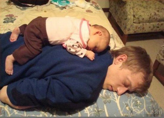 Baby Sleeping On Dad