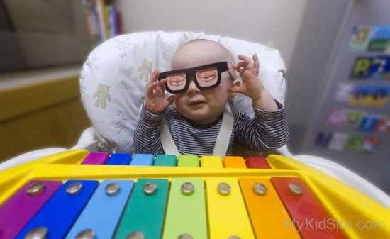 Baby Wearing Funny Glasses