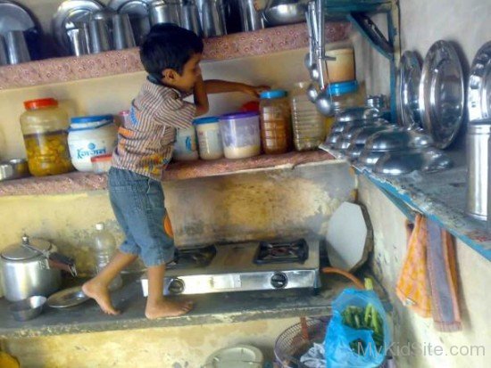 Funny Boy In Kitchen