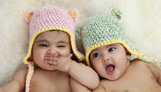 Twin Baby Wearing Colorful Cap