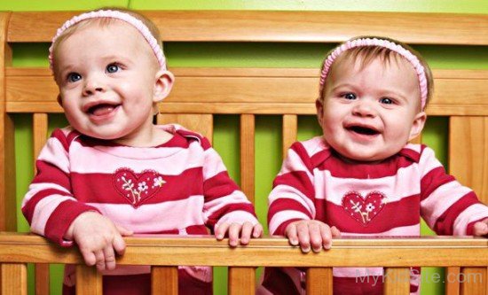 Twin baby Girl Standing