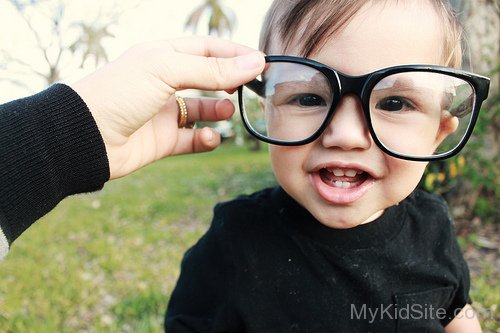 Baby Boy Wearing Glasses