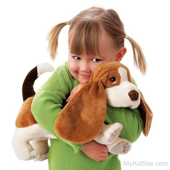 Baby Girl Holding Soft Toy Dog