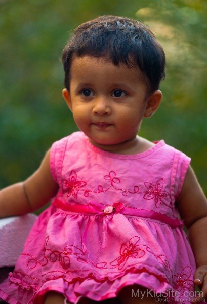 Baby Girl In Pink Dress