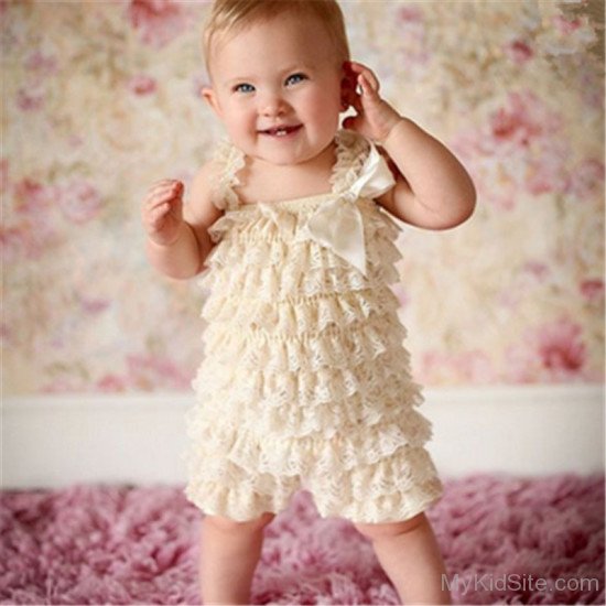 Baby Girl Wearing Ribbon Bow Dress