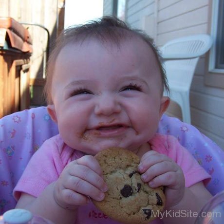 Cute Baby Eating Cookies