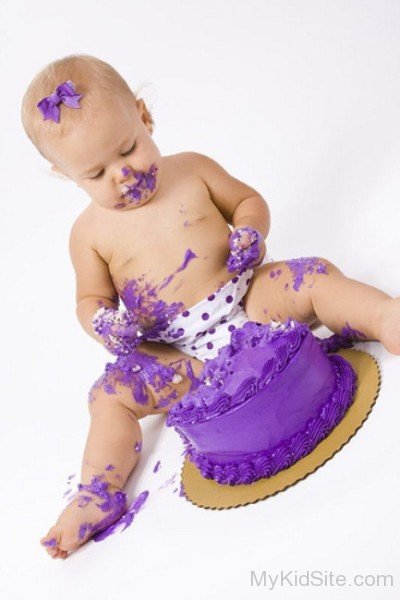 Cute Baby Girl Eating Cake
